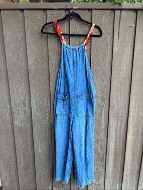Free People Blue Denim Women’s Overalls with Red-Orange Patterned Straps